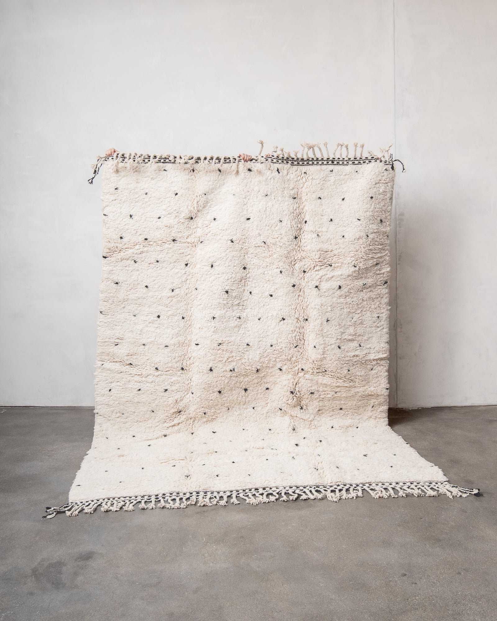 Modern, designer, handcrafted Berber rug from Morocco. Beniourain carpet with beautiful colours and patterns and fluffy wool texture.